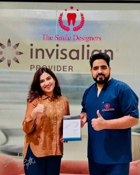 Happy International Patient with The Smile Designers Dentist in Chandigarh